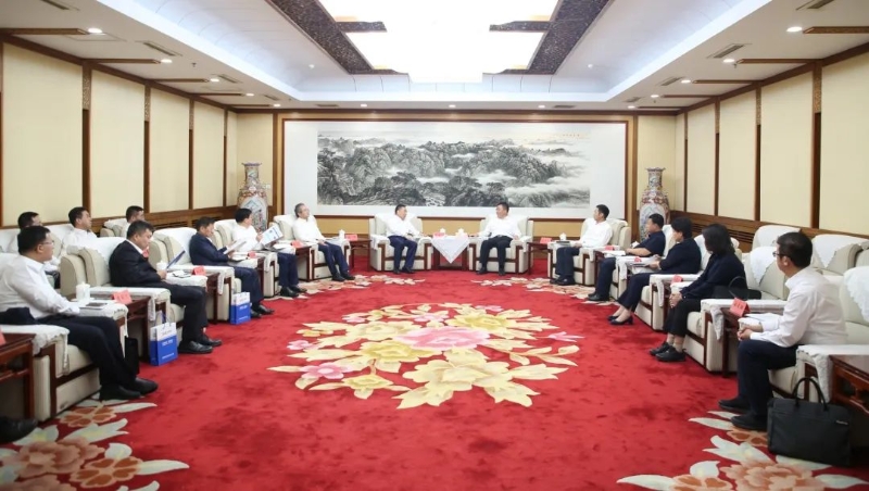宋海良與內(nèi)蒙古自治區(qū)黨委常委、呼和浩特市委書記包鋼座談